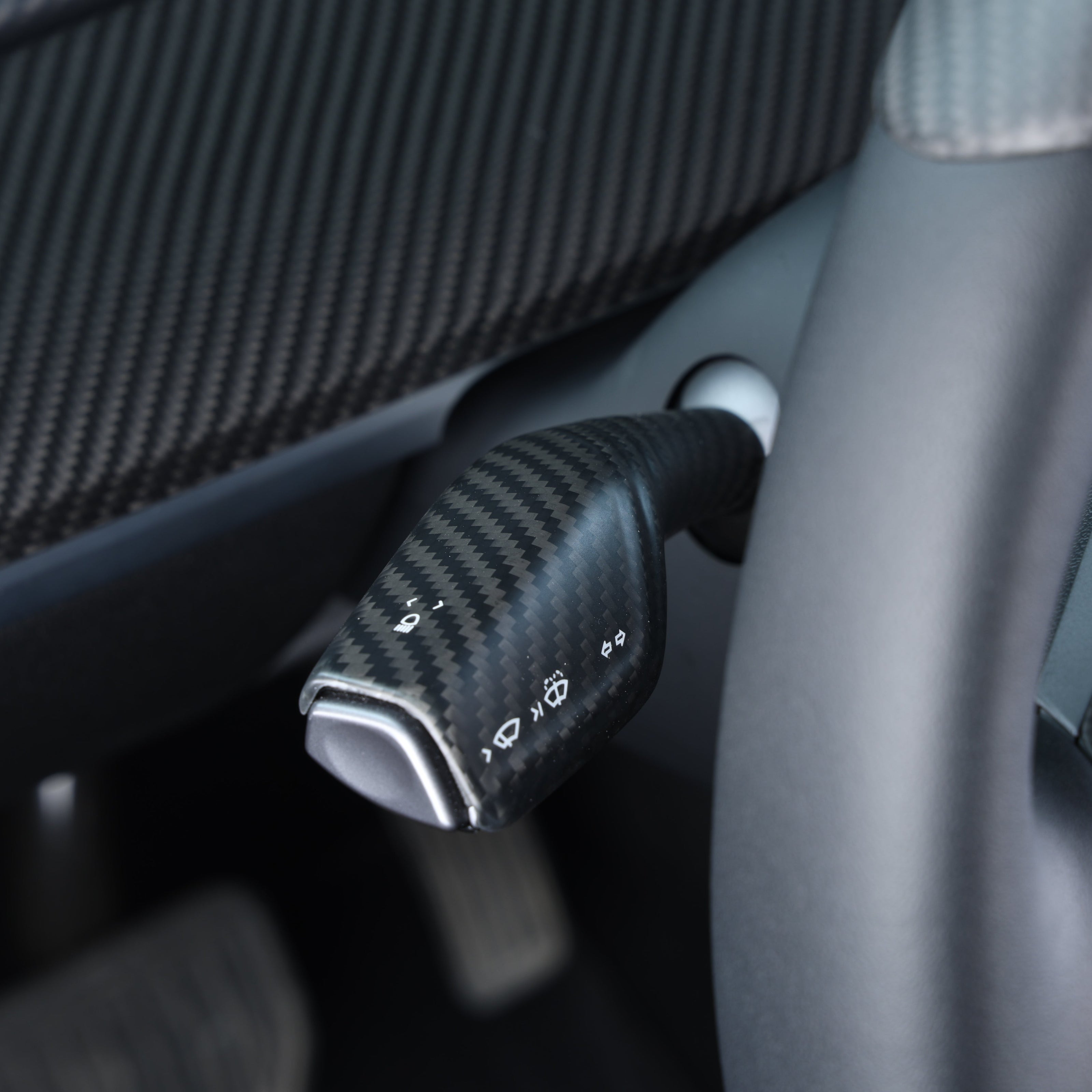 Tesla Model Y shift paddle cover in premium real carbon fiber finish